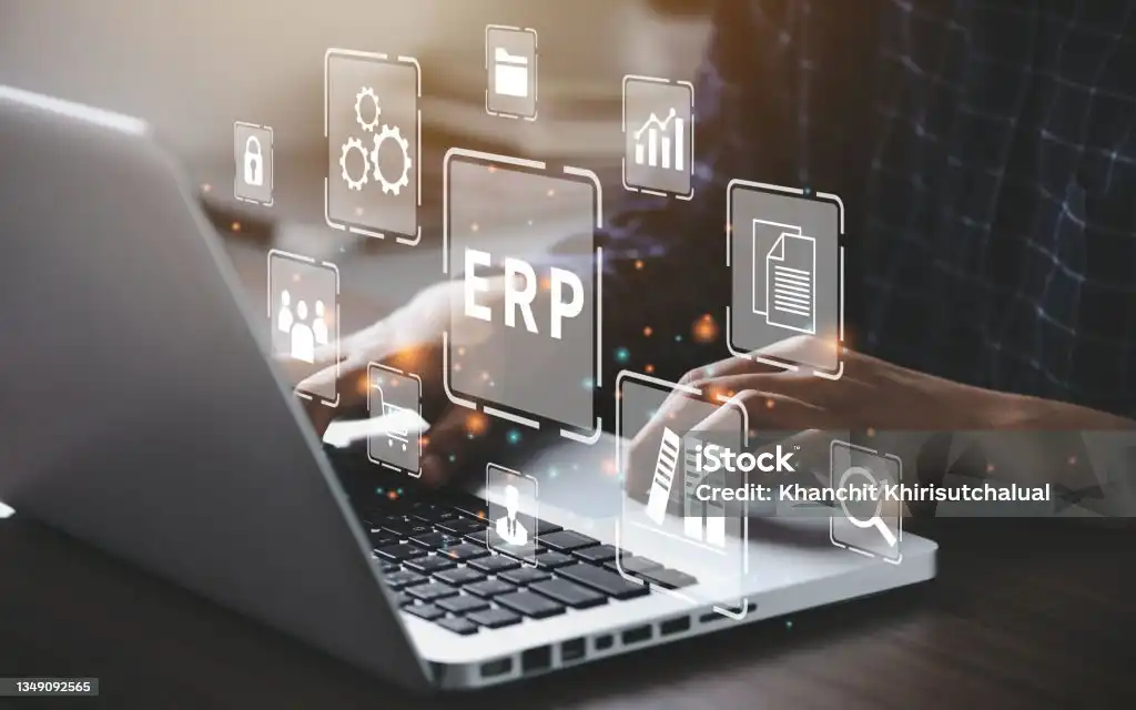 Laptop displaying ERP (Enterprise Resource Planning) icons, representing ELogix's expertise in Oracle E-Business Suite solutions and seamless integration services.